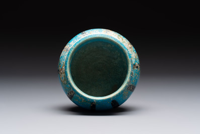 A fine Raqqa turquoise-glazed striped jar, Syria, 13th C.