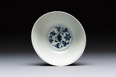 Four Chinese blue and white bowls, two cups and a plate, Ming