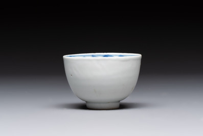 Four Chinese blue and white bowls, two cups and a plate, Ming