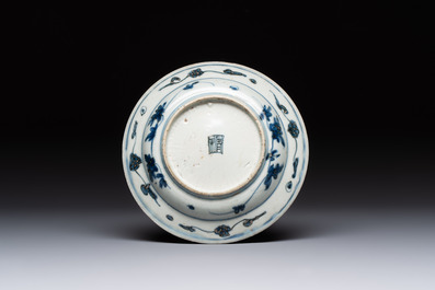 Four Chinese blue and white bowls, two cups and a plate, Ming