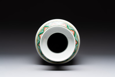 A Chinese famille verte rouleau vase with immortals, 19th C.