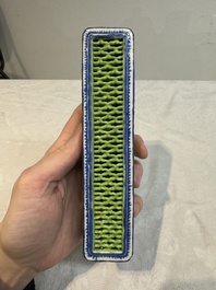 A Chinese blue- and green-enamelled reticulated incense stick holder, 19th C.