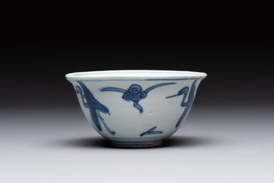 Four Chinese blue and white bowls, two cups and a plate, Ming