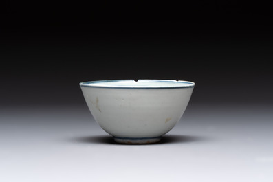 Four Chinese blue and white bowls, two cups and a plate, Ming