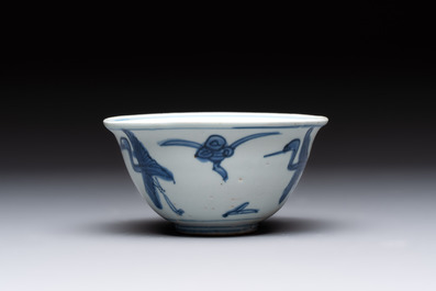 Four Chinese blue and white bowls, two cups and a plate, Ming