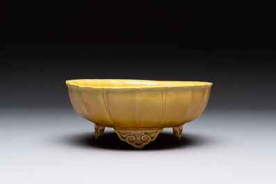 A pair of Chinese yellow-glazed jardini&egrave;res, Yongzheng mark, 20th C.