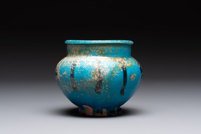 A fine Raqqa turquoise-glazed striped jar, Syria, 13th C.