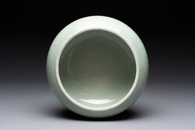 A Chinese celadon-glazed tripod censer with 'anhua' floral design, Kangxi