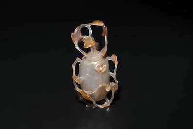 A Chinese jadeite brush washer in the form of a peach and an agate covered jar, 19th C.