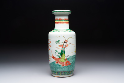 A Chinese famille verte rouleau vase with immortals, 19th C.