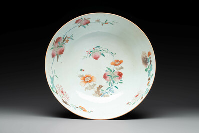 A large Chinese famille rose punch bowl with flowering and fruiting branches, Qianlong