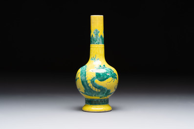 A Chinese wucai 'flying horse' jar, a green-enamelled yellow-ground 'dragon' vase and a Nanking crackle-glazed jar, 19th C.