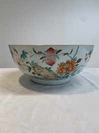 A large Chinese famille rose punch bowl with flowering and fruiting branches, Qianlong