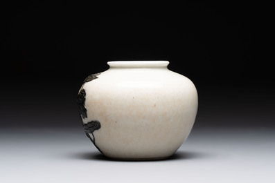 A Chinese wucai 'flying horse' jar, a green-enamelled yellow-ground 'dragon' vase and a Nanking crackle-glazed jar, 19th C.