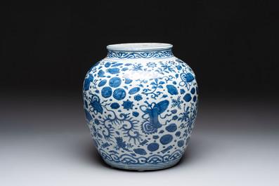 A large Chinese blue and white jar with Buddhist symbols and foliage, Jiajing/Wanli period