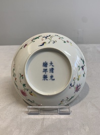 A Chinese famille rose yellow-ground 'butterfly' plate and a saucer with floral design, Guangxu mark, 19/20th C.