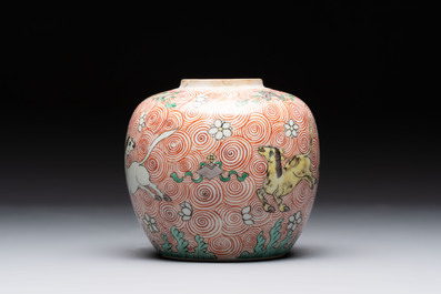 A Chinese wucai 'flying horse' jar, a green-enamelled yellow-ground 'dragon' vase and a Nanking crackle-glazed jar, 19th C.