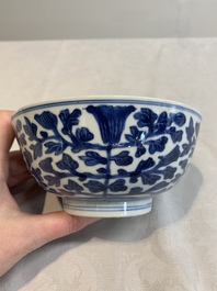 A pair of Chinese blue and white bowls with floral design, Kangxi