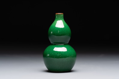 Two Chinese monochrome vases and a water pot on wooden stand, 19/20th C.