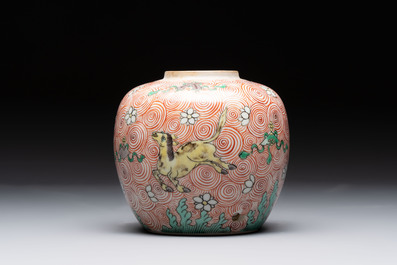 A Chinese wucai 'flying horse' jar, a green-enamelled yellow-ground 'dragon' vase and a Nanking crackle-glazed jar, 19th C.