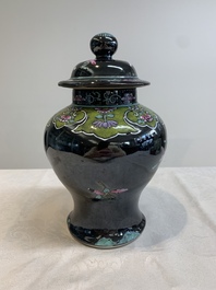 A Chinese famille rose black-ground covered vase and a famille rose Milefo Buddha, Mao Ji Sheng 茂記生造 mark, 19/20th C.