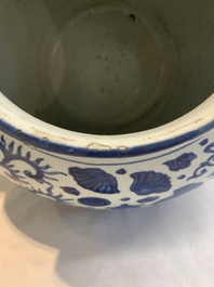 A large Chinese blue and white jar with Buddhist symbols and foliage, Jiajing/Wanli period