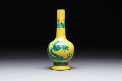 A Chinese wucai 'flying horse' jar, a green-enamelled yellow-ground 'dragon' vase and a Nanking crackle-glazed jar, 19th C.