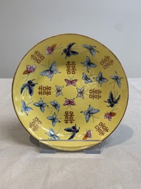 A Chinese famille rose yellow-ground 'butterfly' plate and a saucer with floral design, Guangxu mark, 19/20th C.