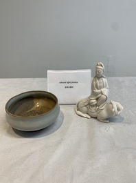 A Chinese 'jun' bowl and a Dehua blanc de Chine group with Guanyin, Ming/Qing