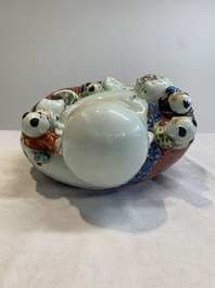 A Chinese famille rose black-ground covered vase and a famille rose Milefo Buddha, Mao Ji Sheng 茂記生造 mark, 19/20th C.