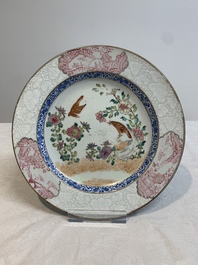 Two Chinese famille rose 'magpies and peonies' plates with bianco-sopra-bianco rims, Yongzheng