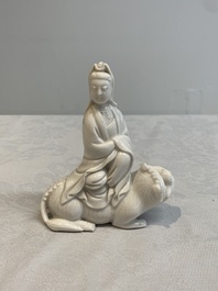 A Chinese 'jun' bowl and a Dehua blanc de Chine group with Guanyin, Ming/Qing