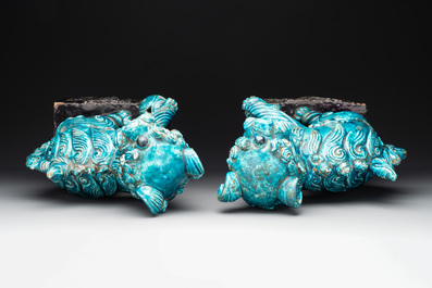 A pair of Chinese turquoise-and-aubergine-glazed Buddhist lions, probably Swatow kilns, 19th C.
