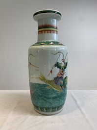 A Chinese famille verte rouleau vase with immortals, 19th C.