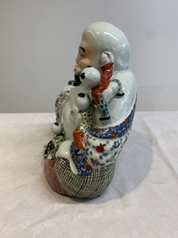 A Chinese famille rose black-ground covered vase and a famille rose Milefo Buddha, Mao Ji Sheng 茂記生造 mark, 19/20th C.