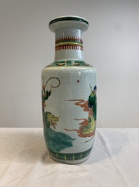 A Chinese famille verte rouleau vase with immortals, 19th C.
