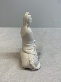 A Chinese 'jun' bowl and a Dehua blanc de Chine group with Guanyin, Ming/Qing