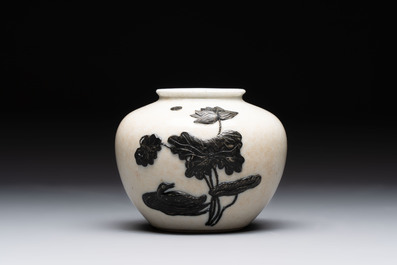 A Chinese wucai 'flying horse' jar, a green-enamelled yellow-ground 'dragon' vase and a Nanking crackle-glazed jar, 19th C.
