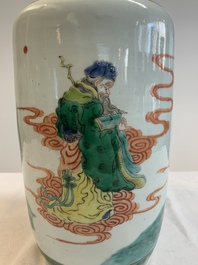 A Chinese famille verte rouleau vase with immortals, 19th C.