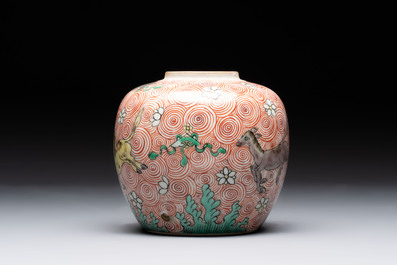 A Chinese wucai 'flying horse' jar, a green-enamelled yellow-ground 'dragon' vase and a Nanking crackle-glazed jar, 19th C.