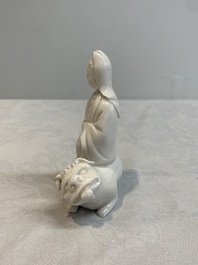 A Chinese 'jun' bowl and a Dehua blanc de Chine group with Guanyin, Ming/Qing