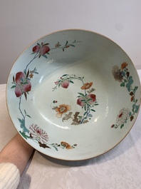 A large Chinese famille rose punch bowl with flowering and fruiting branches, Qianlong
