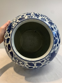 A large Chinese blue and white jar with Buddhist symbols and foliage, Jiajing/Wanli period
