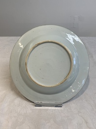 Two Chinese famille rose 'magpies and peonies' plates with bianco-sopra-bianco rims, Yongzheng