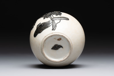 A Chinese wucai 'flying horse' jar, a green-enamelled yellow-ground 'dragon' vase and a Nanking crackle-glazed jar, 19th C.