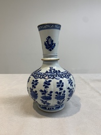 A pair of Chinese blue and white hookah bases with floral design, Kangxi