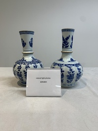 A pair of Chinese blue and white hookah bases with floral design, Kangxi