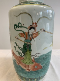 A Chinese famille verte rouleau vase with immortals, 19th C.