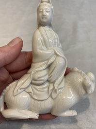 A Chinese 'jun' bowl and a Dehua blanc de Chine group with Guanyin, Ming/Qing