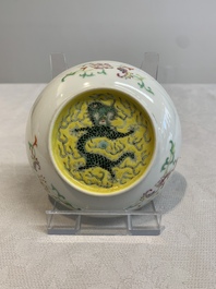 A Chinese famille rose yellow-ground 'butterfly' plate and a saucer with floral design, Guangxu mark, 19/20th C.